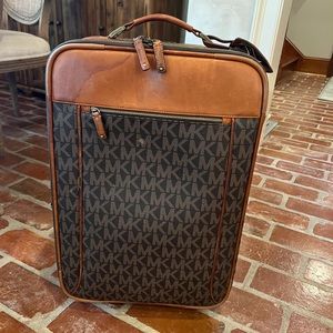 Michael Kors signature travel luggage